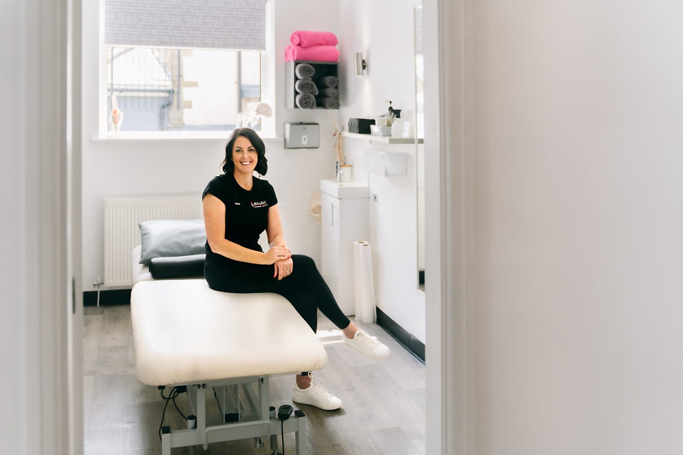 Katie Bell in her physiotherapy clinic - Founder of Thrive Business Coaching