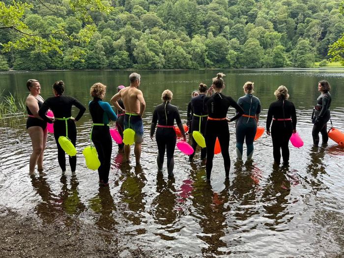 Ascend members wild swimming at the retreat