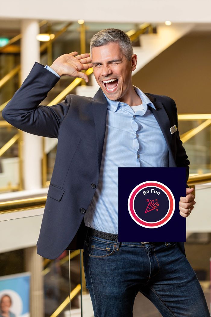 Bruno De Jongh holding the Be Fun values board